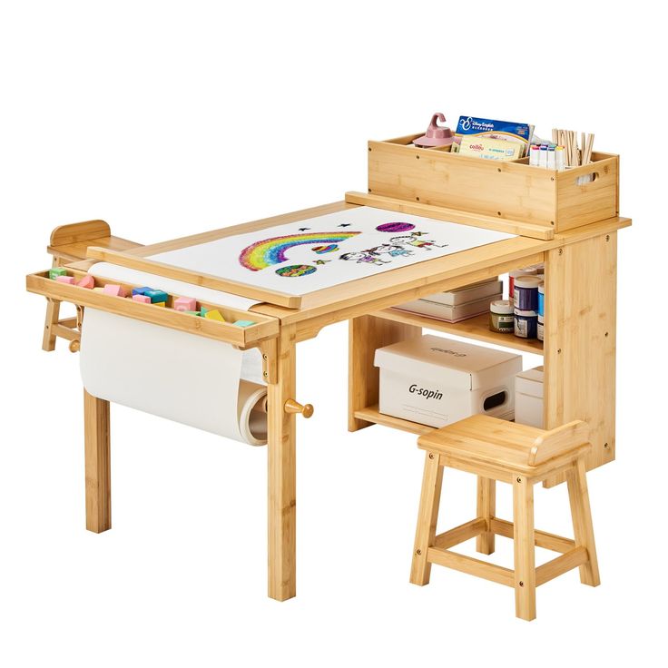 This may contain: a wooden desk with an art easel and craft box on it's side
