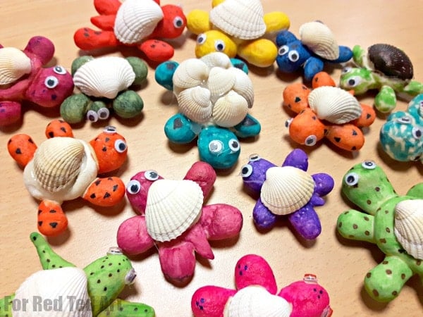 Several examples of colorful salt dough sea shell turles.