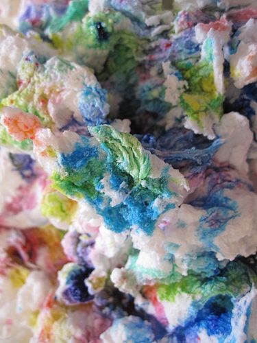 This may contain: the colorful food is mixed together with other things to make it look like they are made out of marshmallows