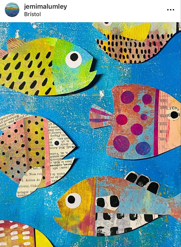 This may contain: an art project made out of paper with different types of fish on the blue background