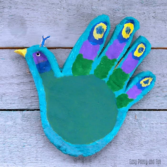 Example of handprint peacock salt dough craft for kids.