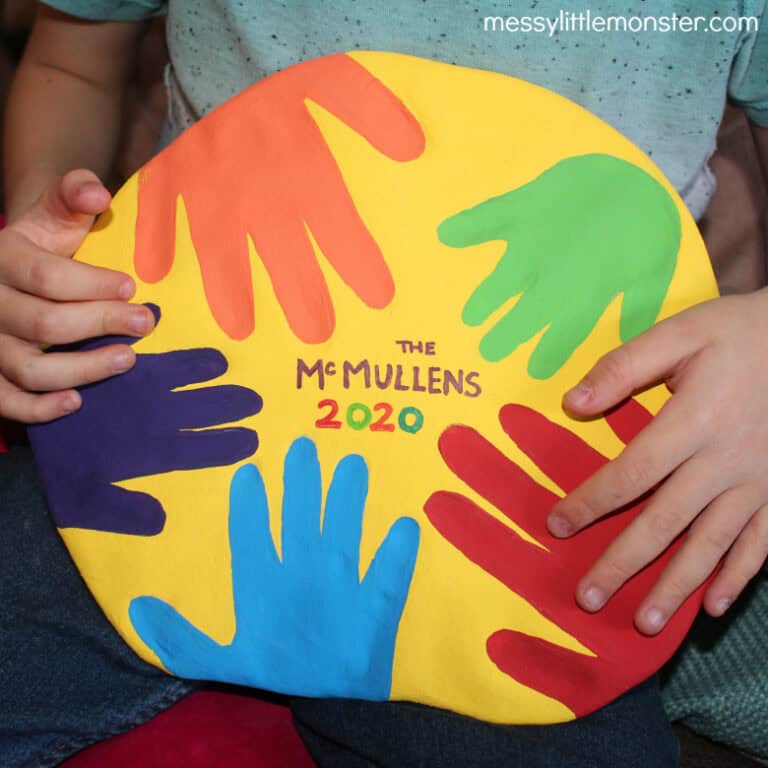 Example of salt dough family handprint keepsake with children's hands.