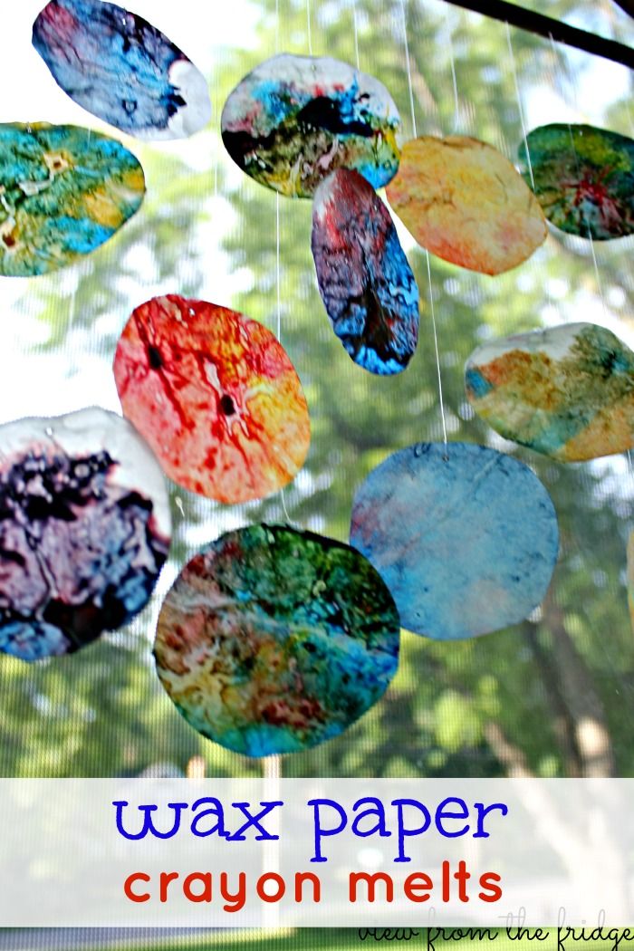 This may contain: a close up of a wind catcher made out of wax paper and crayon melts