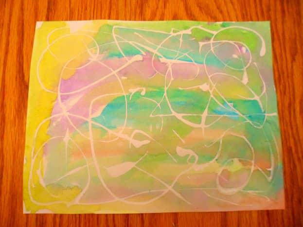 A beautiful abstract painting with a variety of colors, shapes, and lines.