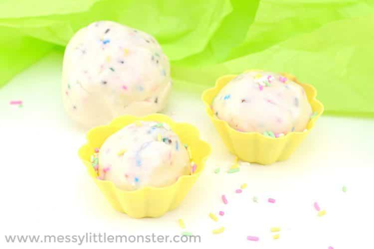 A group of cupcakes with sprinkles on a white surface

Description automatically generated with low confidence