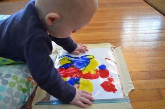 infant on tummy painting.jpg