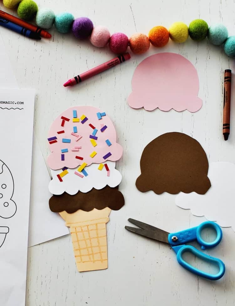 Ice cream cone craft from paper next to kids scissors and an ice cream cone coloring page.