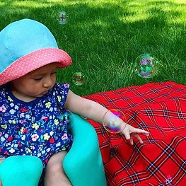 Playing with Bubbles Outside on Day 1 of the 100 Days of Outdoor Play Challenge
