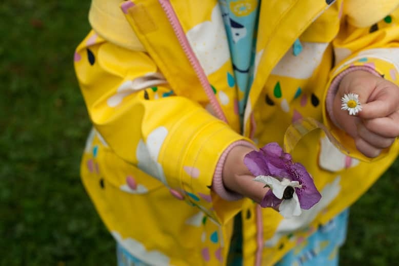 Child creating a journey stick