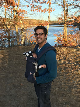 Wike Dad with tiny baby in front carrier.