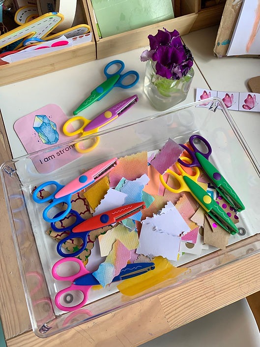 Kids art and craft idea using fancy scissors and coloured paper.