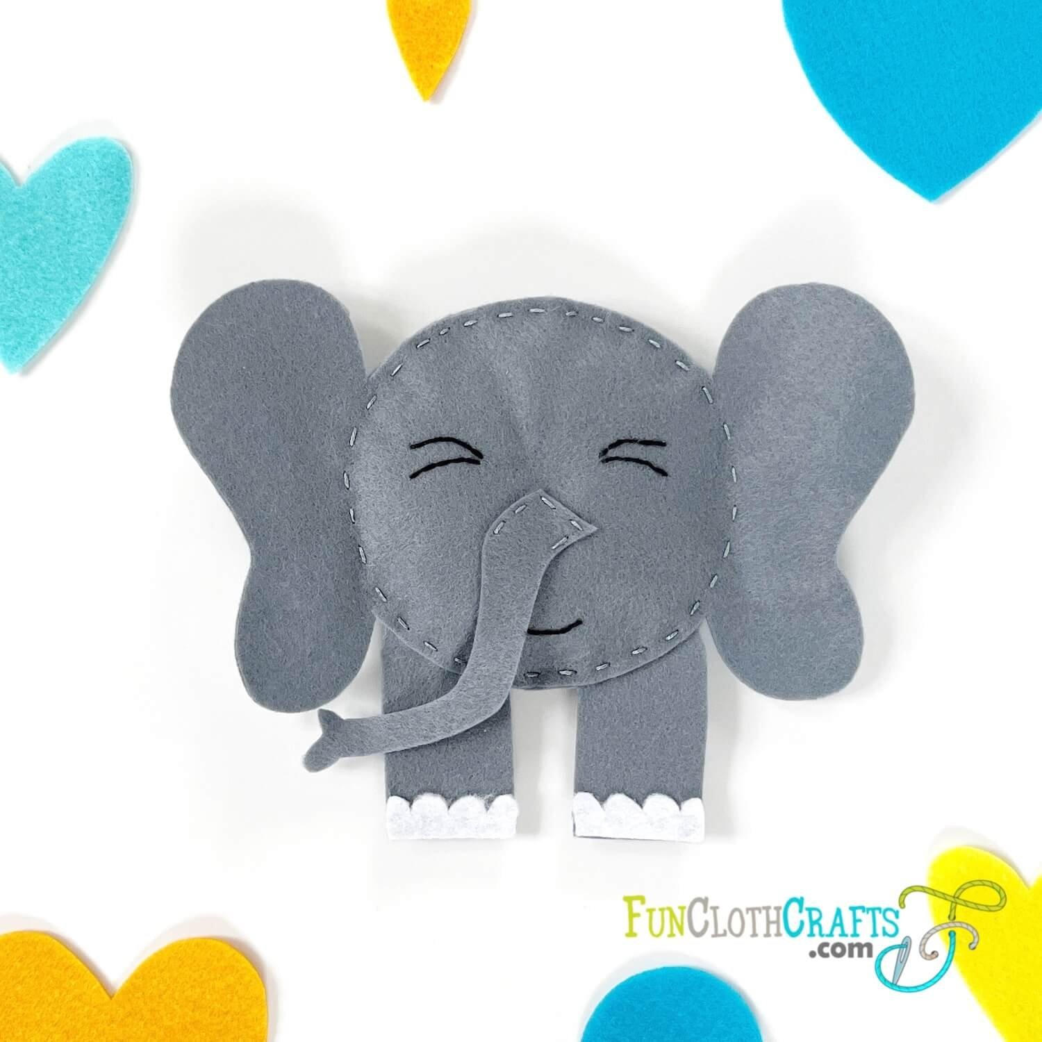 free felt animal pattern for cute felt elephant with dreamy eyes and smily mouth, felt elephant softie free pattern