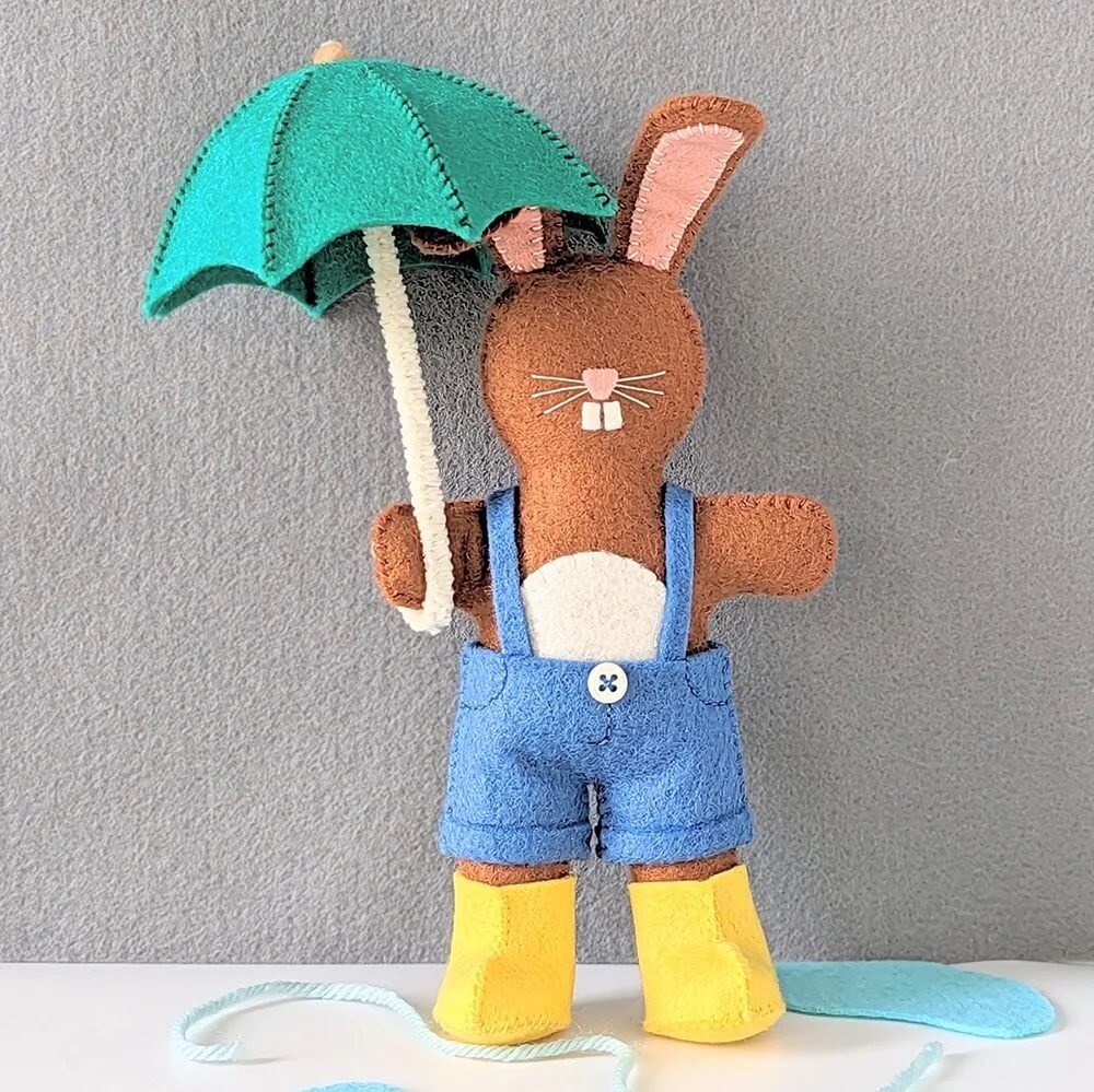free felt animal pattern for brown bunny with green umbrella and rain boots